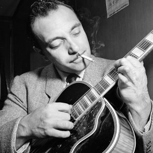 Django Reinhardt at the Aquarium jazz club in New York, NY / photogr. W. P. Gottlieb, 1946