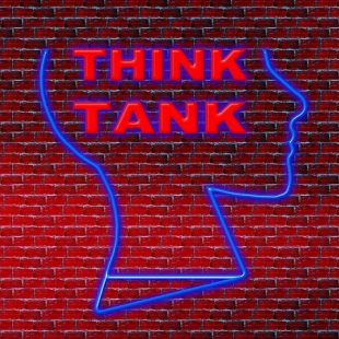 mur de brique, profil de tête et inscription Think tank