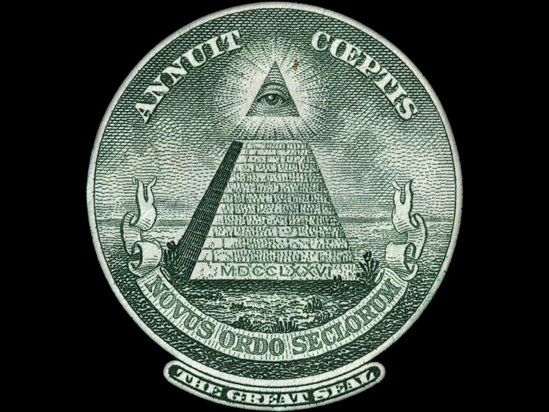 Symbole de l'œil surmontant la pyramide sur le billet d'un dollar américain